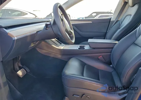 2023 Tesla Model Y from USA, damaged, VIN 7SAYGDEE0PA203072